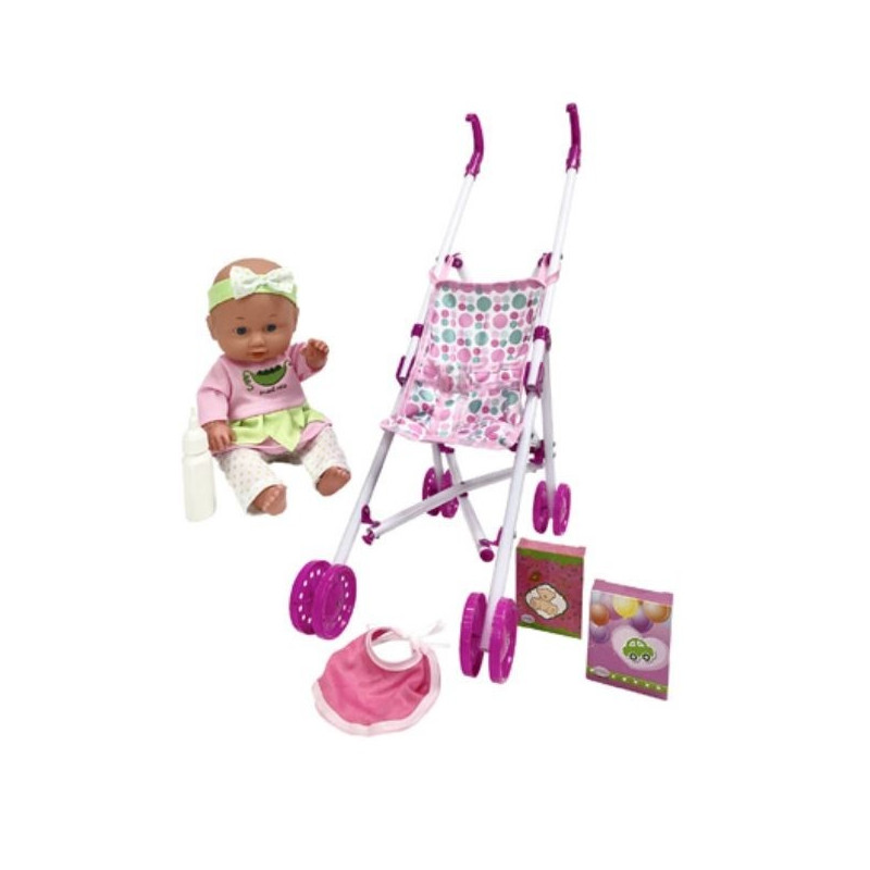 Dockan Julka, 30 cm lång, i vagnen.