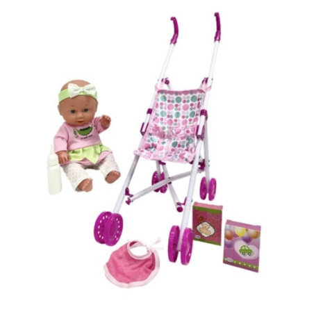 Dockan Julka, 30 cm lång, i vagnen.