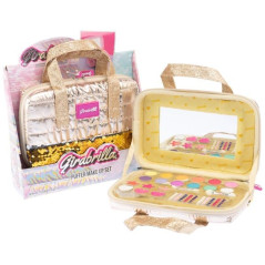 Väskan med smink har en guldig dragkedja.