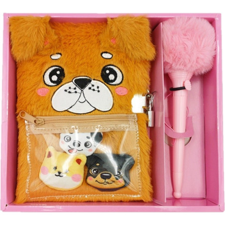 Dagbok med en plyschhund och penna