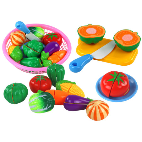 Set av grönsaker på en korg 8 st Tallrik Kniv