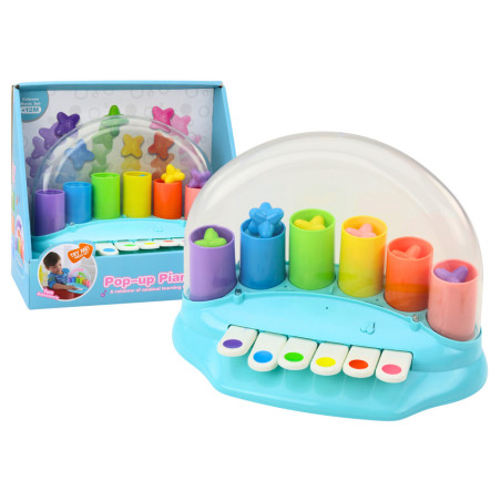 Interaktivt piano med pop-up-stjärnor i blått.