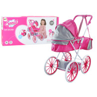 Vagn för dockor i metall med stor väska och stora rosa hjul.