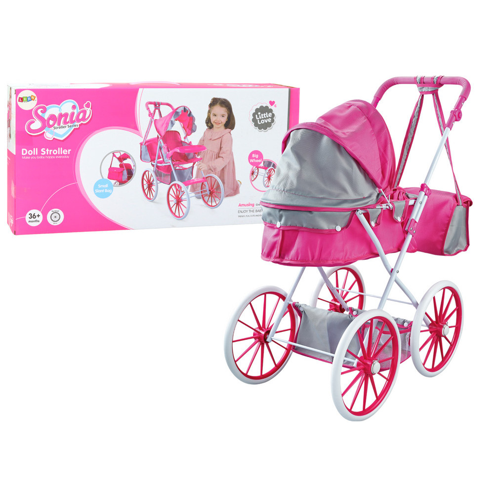 Vagn för dockor i metall med stor väska och stora rosa hjul.