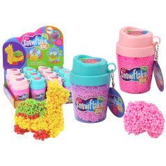 Mjuka Styroporkulor i en rosa kopp