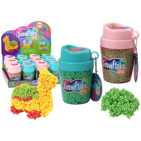 Mjuka Styroporkulor i en grön mugg