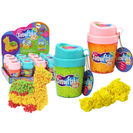 Squishy skumkulor i en kopp gul