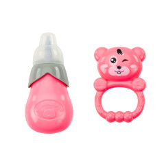 Dockan i marinblå klänning som skakar en skallrande flaska ljud.