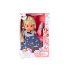 Dockan i marinblå klänning som skakar en skallrande flaska ljud.