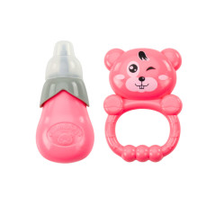 Dockan i rosa klänning, kissande flaska skallra ljud.