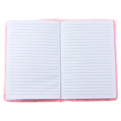 Mjuk anteckningsbok med linjer med en kanin som skriver Love i rosa.