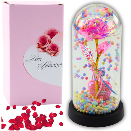 Den eviga rosen i en kupol med LED-belysning, rosa med ett hjärta och små kulor.