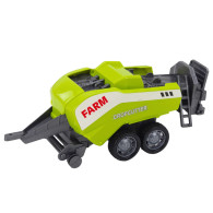 Traktor med lastare och grönmålning.