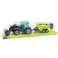 Traktor med lastare och grönmålning.