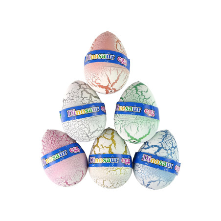Det kläckande magiska dinosaurieägget som växer till 7,5 cm, vitt.