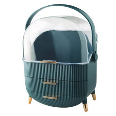 Organizator för kosmetika med öppningsbar transparent lock och två gröna lådor.