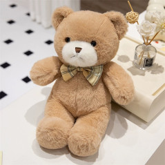 Mjuk plyschmaskot med rosett, björn, beige, 25 cm