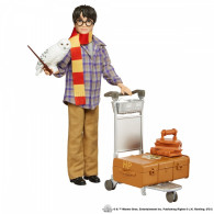 Set med en Harry Potter-docka på plattform 9 3/4.