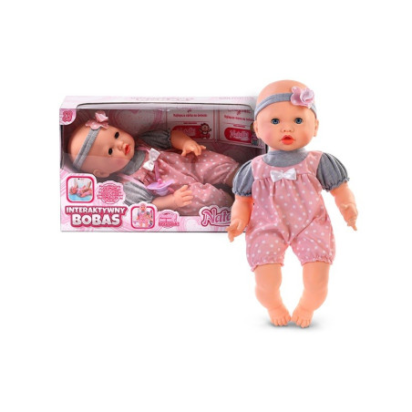 Dockan Natalia, en mimande bebisdocka med napp.