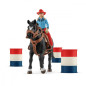 Set med cowboy- och hästfigurer och en hästkapplöpning runt tunnor i Farm World.