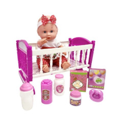 Dockan Julka med en vagga