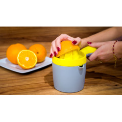 Handpress för citrusfrukter