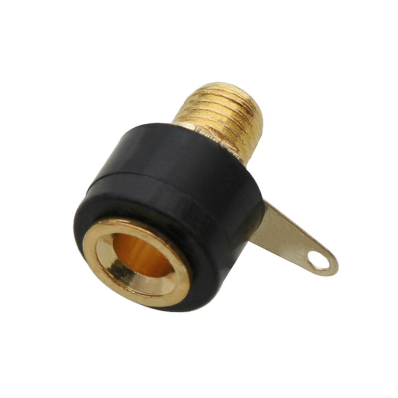 2082 - Bananpluggen är liten, svart och guld.